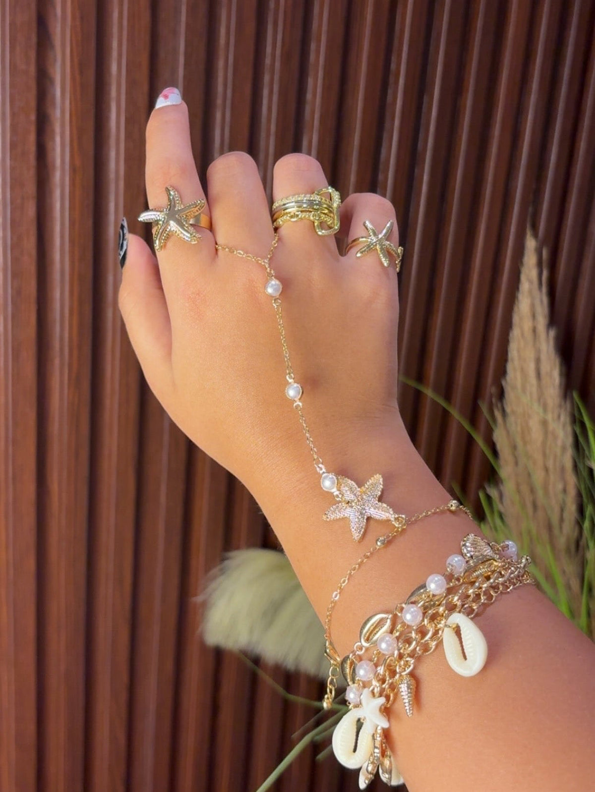 Hand chain and bracelets