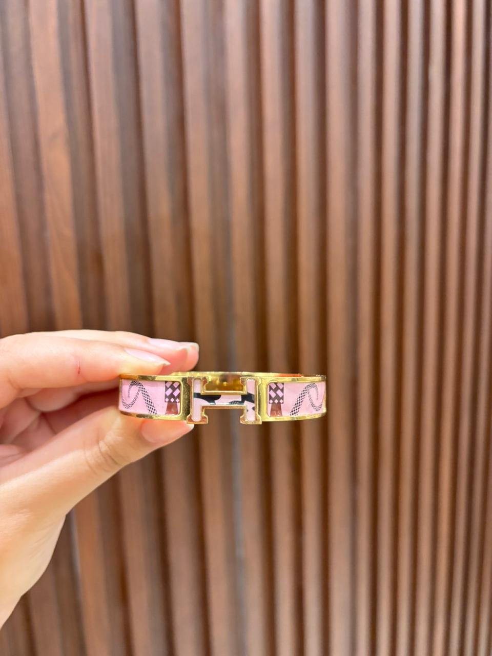 Pink patterned hermes bracelet